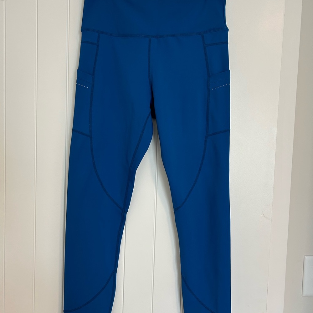 Zyia size 8/10 Blue Reflective Pocket Light n Tight Hi-Rise 7/8 24"